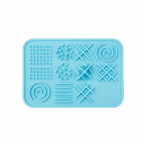Silicone lick mat for dogs and cats filled with peanut butter